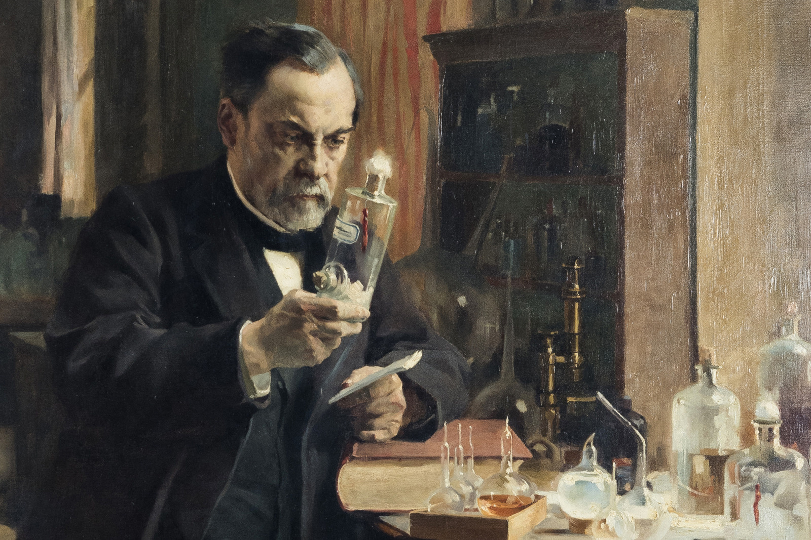 « Pasteur dans son laboratoire » (1885), détail. Huile sur toile (réplique) peinte par Albert Edelfelt (1854-1905) et Hélène Schjerfbeck (1862-1946) en 1885 montrant Louis Pasteur (1822-1895) dans son laboratoire de l'Ecole normale supérieure en 1885 tenant un flacon contenant de la moelle épinière d'un lapin inoculé par le virus de la rage.